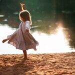 Girl Dancing in the sand